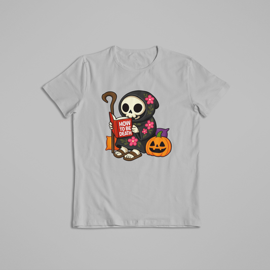 Cute Grim Reaper Reading Book Halloween T-Shirt & Hoodie – Funny Skeleton Pumpkin Spooky Shirt
